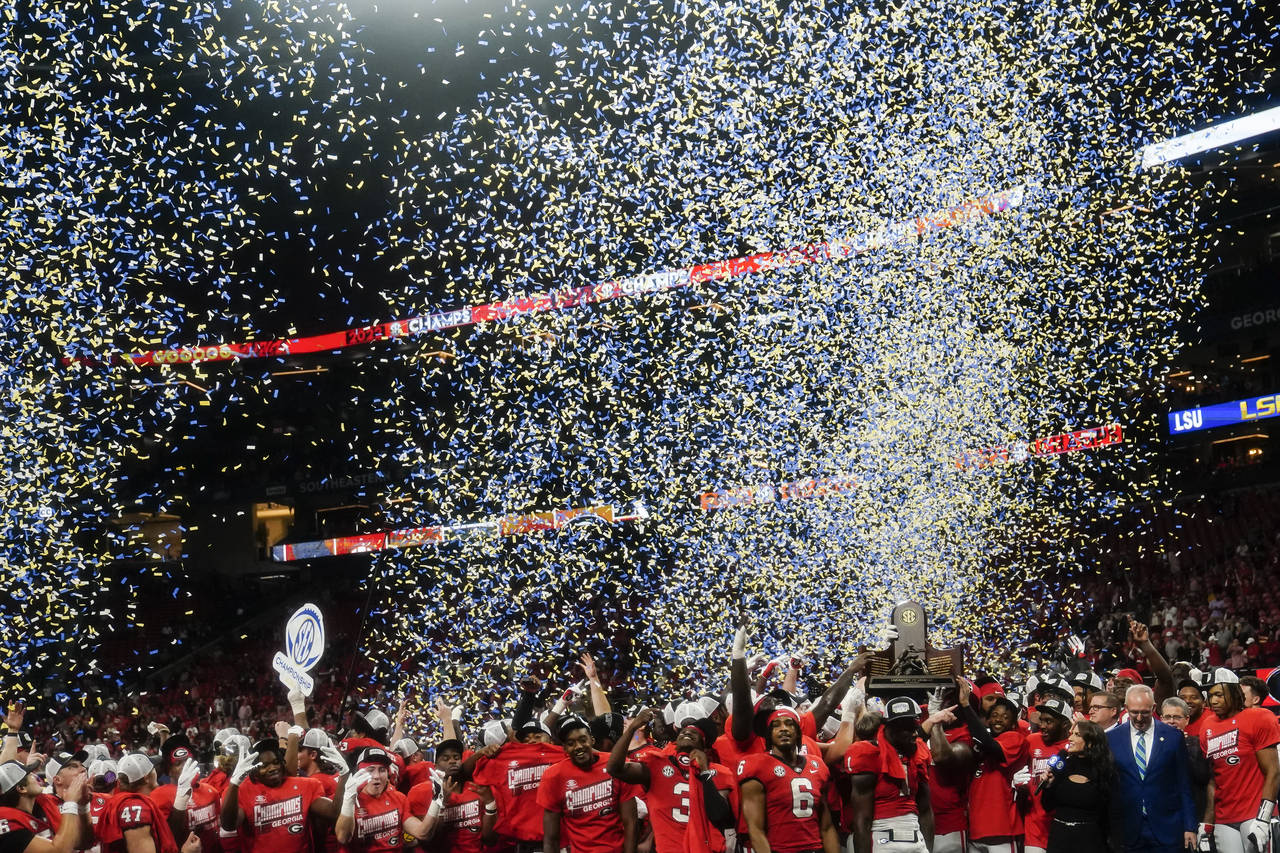 Georgia celebrates a win against LSU in the after the Southeastern Conference championship NCAA col...