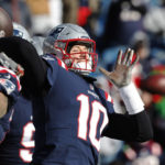 
              New England Patriots quarterback Mac Jones (10) winds up to pass while warming up prior to an NFL football game between the Cincinnati Bengals and the Patriots, Saturday, Dec. 24, 2022, in Foxborough, Mass. (AP Photo/Michael Dwyer)
            