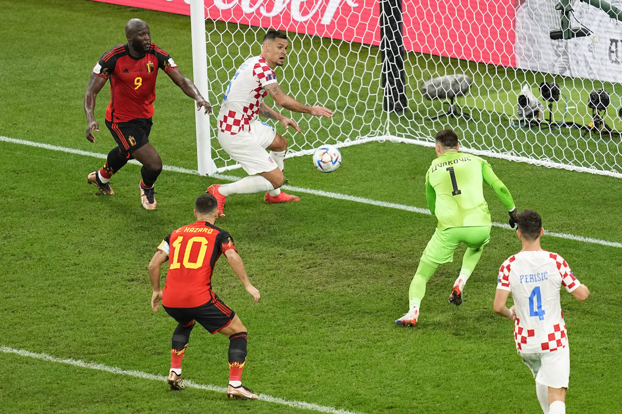Belgium's Romelu Lukaku (9) and teammate Eden Hazard (10) attack as Croatia's Dejan Lovren (6), goa...
