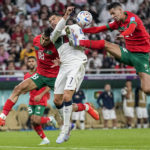 
              Morocco's Bilal El Khannous, right, fights for the ball with Portugal's Cristiano Ronaldo during the World Cup quarterfinal soccer match between Morocco and Portugal, at Al Thumama Stadium in Doha, Qatar, Saturday, Dec. 10, 2022. (AP Photo/Ariel Schalit)
            