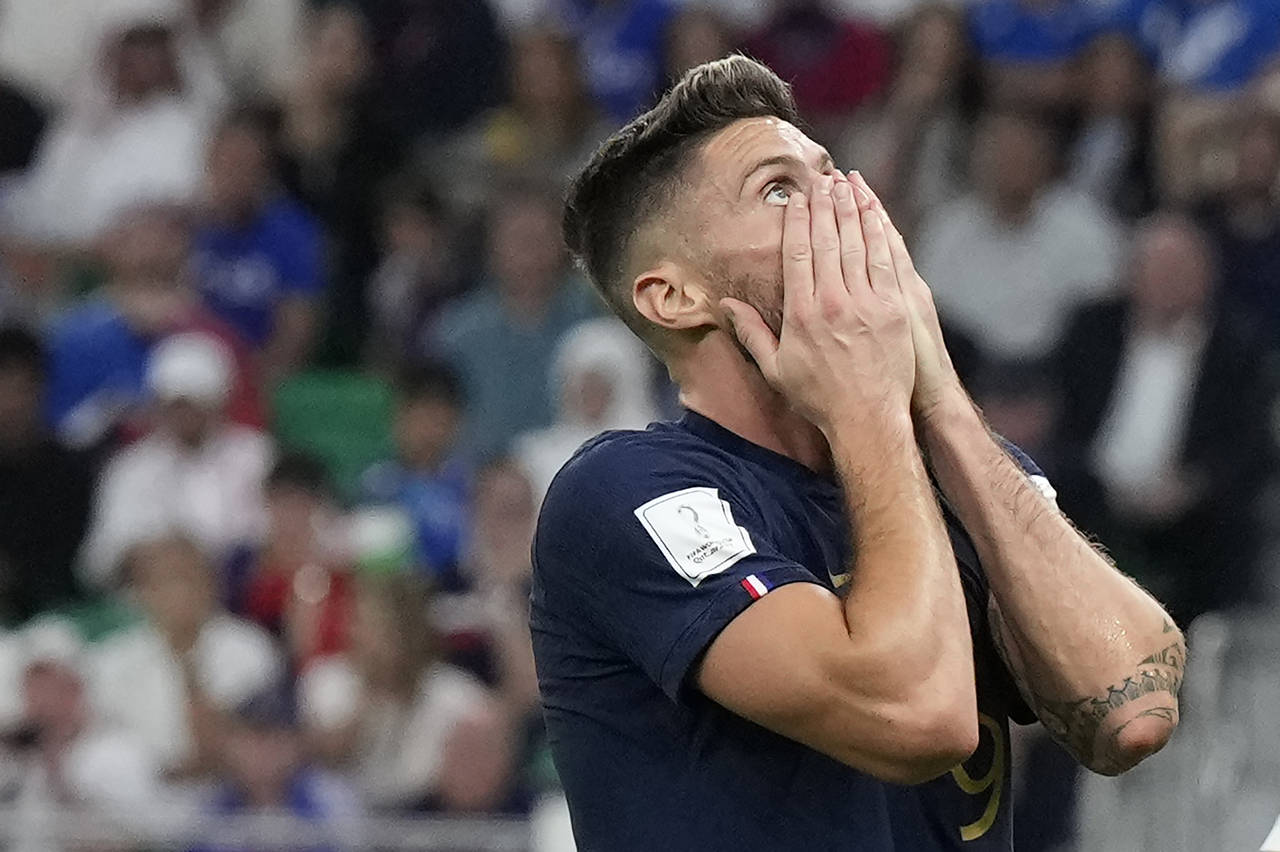 France's Olivier Giroud reacts during the World Cup round of 16 soccer match between France and Pol...
