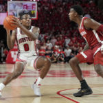 
              Houston guard Marcus Sasser (0) pulls up short while defended by Alabama guard Jaden Bradley (0) during the second half of an NCAA college basketball game, Saturday, Dec. 10, 2022, in Houston. (AP Photo/Kevin M. Cox)
            