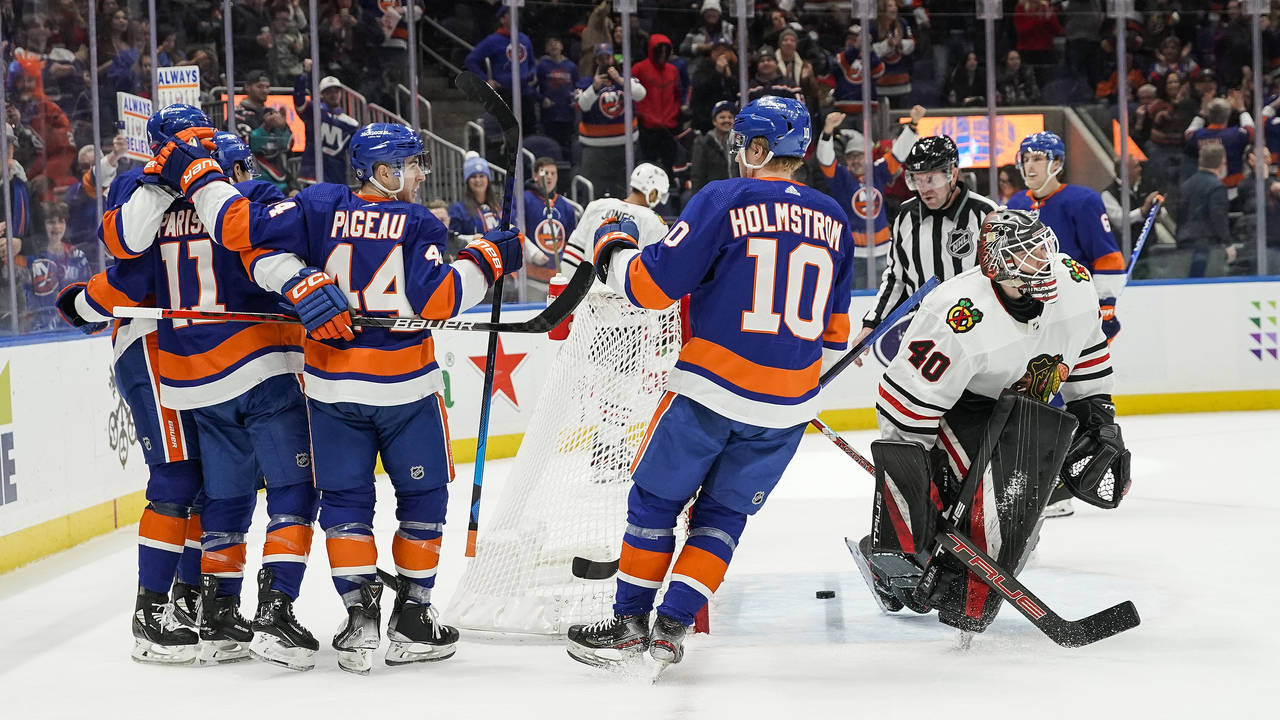 New York Islanders celebrate after scoring a goal against the Chicago Blackhawks during the second ...