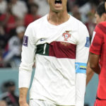 
              Portugal's Cristiano Ronaldo reacts during the World Cup group H soccer match between South Korea and Portugal, at the Education City Stadium in Al Rayyan , Qatar, Friday, Dec. 2, 2022. (AP Photo/Francisco Seco)
            