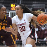
              Stanford guard Haley Jones (30) drives against Arizona State guard Isadora Sousa (44) during the first quarter of an NCAA college basketball game Saturday, Dec. 31, 2022, in Stanford, Calif. (AP Photo/Darren Yamashita)
            