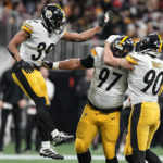 
              Pittsburgh Steelers safety Minkah Fitzpatrick (39) defensive tackle Cameron Heyward (97) and linebacker T.J. Watt (90) celebrate the sacking of Atlanta Falcons quarterback Marcus Mariota during the first half of an NFL football game, Sunday, Dec. 4, 2022, in Atlanta. (AP Photo/Brynn Anderson)
            
