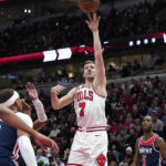 
              Chicago Bulls' Goran Dragic shoots during the first half of an NBA basketball game against the Washington Wizards Wednesday, Dec. 7, 2022, in Chicago. (AP Photo/Charles Rex Arbogast)
            