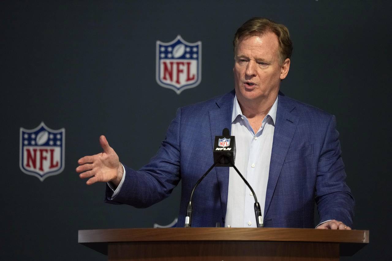 FILE -NFL Commissioner Roger Goodell answers questions from reporters at a press conference follow...