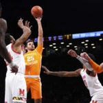 
              Tennessee guard Santiago Vescovi (25) goes up to shoot during the first half of an NCAA college basketball game against Maryland in the Basketball Hall of Fame Invitational, Sunday, Dec. 11, 2022, in New York. (AP Photo/Julia Nikhinson)
            