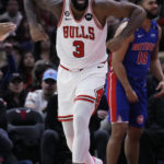
              Chicago Bulls center Andre Drummond reacts after scoring a basket during the second half of the team's NBA basketball game against the Detroit Pistons in Chicago, Friday, Dec. 30, 2022. The Bulls won 132-118. (AP Photo/Nam Y. Huh)
            