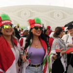 
              FILE - Female Morocco fans arrive at the stadium before the World Cup quarterfinal soccer match between Morocco and Portugal, at Al Thumama Stadium in Doha, Qatar, Saturday, Dec. 10, 2022. (AP Photo/Ebrahim Noroozi, File)
            