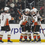 
              Anaheim Ducks right wing Frank Vatrano (77) celebrates with teammates after scoring during the second period of an NHL hockey game against the Los Angeles Kings Tuesday, Dec. 20, 2022, in Los Angeles. (AP Photo/Ashley Landis)
            