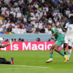 
              England's Bukayo Saka, right, scores his side's third goal during the World Cup round of 16 soccer match between England and Senegal, at the Al Bayt Stadium in Al Khor, Qatar, Sunday, Dec. 4, 2022. (AP Photo/Manu Fernandez)
            