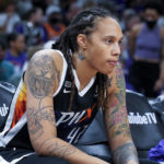 
              FILE - Phoenix Mercury center Brittney Griner sits during the first half of Game 2 of basketball's WNBA Finals against the Chicago Sky, Wednesday, Oct. 13, 2021, in Phoenix. Brittney Griner said she's “grateful” to be back in the United States and plans on playing basketball again next season for the WNBA's Phoenix Mercury a week after she was released from a Russian prison and freed in a dramatic high-level prisoner exchange. “It feels so good to be home!” Griner posted to Instagram on Friday, Dec. 16, 2022, in her first public statement since her release. (AP Photo/Rick Scuteri, File)
            