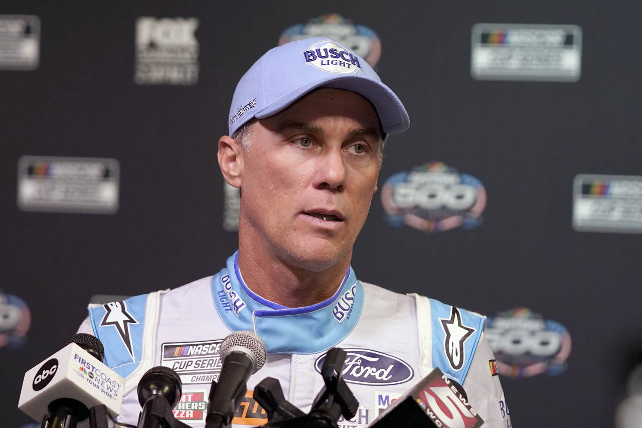 FILE - Kevin Harvick speaks during NASCAR Daytona 500 auto racing media day at Daytona Internationa...