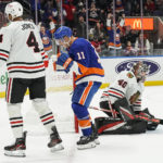 
              New York Islanders left wing Zach Parise (11) celebrates after scoring against the Chicago Blackhawks during the second period of an NHL hockey game on Sunday, Dec. 4, 2022, in Elmont, N.Y. (AP Photo/Eduardo Munoz Alvarez)
            