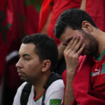 
              A fan of Morocco cries after the World Cup semifinal soccer match between France and Morocco at the Al Bayt Stadium in Al Khor, Qatar, Thursday, Dec. 15, 2022. Morocco lost 0-2. (AP Photo/Natacha Pisarenko)
            