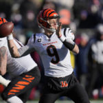 
              Cincinnati Bengals quarterback Joe Burrow (9) winds up to pass during the first half of an NFL football game against the New England Patriots, Saturday, Dec. 24, 2022, in Foxborough, Mass. (AP Photo/Charles Krupa)
            