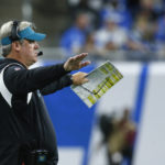 
              Jacksonville Jaguars head coach Doug Pederson signals from the sideline during the first half of an NFL football game against the Detroit Lions, Sunday, Dec. 4, 2022, in Detroit. (AP Photo/Duane Burleson)
            