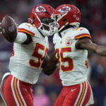 
              Kansas City Chiefs linebacker Willie Gay (50) celebrates with teammate cornerback Jaylen Watson (35) after he recovered a fumble against the Houston Texans during overtime in an NFL football game Sunday, Dec. 18, 2022, in Houston. (AP Photo/Eric Christian Smith)
            