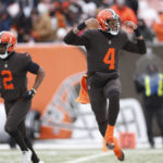 
              Cleveland Browns quarterback Deshaun Watson (4) reacts after his 12-yard rushing touchdown during the first half of an NFL football game against the New Orleans Saints, Saturday, Dec. 24, 2022, in Cleveland. (AP Photo/Ron Schwane)
            