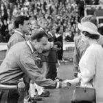 
              FILE -  Britain's Queen Elizabeth II shakes hands with England defender George Cohen as she was introduced the England team before the start of the Football World Cup match between England and Uruguay ay Wembley Stadium, London, on July 11, 1966. George Cohen, the right-back for England World Cup-winning team of 1966, has died aged 83, his former club Fulham have announced on Friday, Dec. 23, 2022. (AP Photo/Bippa, File)
            