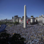 
              Argentine soccer fans celebrate their team's World Cup victory over France, in Buenos Aires, Argentina, Sunday, Dec. 18, 2022. (AP Photo/Matilde Campodonico)
            