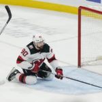 
              New Jersey Devils left wing Tomas Tatar (90) scores on an empty net during the third period of an NHL hockey game against the Florida Panthers, Wednesday, Dec. 21, 2022, in Sunrise, Fla. The Devils defeated the Panthers 4-2. (AP Photo/Marta Lavandier)
            