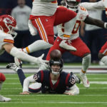
              Houston Texans quarterback Davis Mills (10) fumble the ball during overtime in an NFL football game against the Kansas City Chiefs Sunday, Dec. 18, 2022, in Houston. Kansas City Chiefs recovered the ball. (AP Photo/David J. Phillip)
            