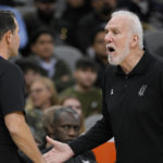 
              San Antonio Spurs head coach Gregg Popovich, right, speaks with referee Brian Forte during the second half of an NBA basketball game against the Utah Jazz, Monday, Dec. 26, 2022, in San Antonio. (AP Photo/Darren Abate)
            