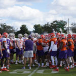 
              Clemson Tigers players gather around head coach Dabo Swinney, center, during a practice session ahead of the 2022 Orange Bowl, Wednesday, Dec. 28, 2022, in Fort Lauderdale, Fla. Clemson will face the Tennessee Volunteers in the Orange Bowl on Friday, Dec. 30. (AP Photo/Rebecca Blackwell)
            
