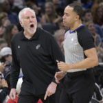 
              San Antonio Spurs coach Gregg Popovich, left, argues with official Jonathan Sterling during the first half of the team's NBA basketball game against the Orlando Magic, Friday, Dec. 23, 2022, in Orlando, Fla. (AP Photo/Phelan M. Ebenhack)
            