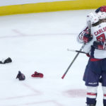 
              Washington Capitals' Alex Ovechkin is hugged by John Carlson after scoring his 800th career goal, on a hat trick against the Chicago Blackhawks during the third period of an NHL hockey game Tuesday, Dec. 13, 2022, in Chicago. (AP Photo/Charles Rex Arbogast)
            