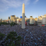 
              Argentina soccer fans celebrate their team's victory over Croatia in a World Cup semifinal match, by the Obelisk in downtown Buenos Aires, Argentina, Tuesday, Dec. 13, 2022. (AP Photo/Victor R. Caivano)
            
