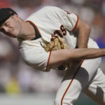 
              FILE - San Francisco Giants' Tyler Rogers throws against the Arizona Diamondbacks during a baseball game in San Francisco, Oct. 2, 2022. Just minutes after Taylor Rogers insisted he and identical twin Tyler would never pull any pranks, his brother did just that as Taylor finished his introductory video call with the Giants to join the same San Francisco bullpen as Tyler. (AP Photo/Jeff Chiu, File)
            
