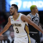
              New Orleans Pelicans guard CJ McCollum (3) reacts after scoring a 3-point shot in the second half of an NBA basketball game against the San Antonio Spurs in New Orleans, Thursday, Dec. 22, 2022. The Pelicans won 126-117. (AP Photo/Gerald Herbert)
            