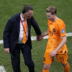
              head coach Louis van Gaal of the Netherlands talks with Frankie de Jong as he leaves the pitch during the World Cup group A soccer match between the Netherlands and Qatar, at the Al Bayt Stadium in Al Khor , Qatar, Tuesday, Nov. 29, 2022. (AP Photo/Ariel Schalit)
            