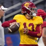 
              Southern California quarterback Caleb Williams (13) practices ahead of the Cotton Bowl NCAA college football game against Tulane, Thursday, Dec. 29, 2022, in Arlington, Texas. The Cotton Bowl is scheduled for Monday, Jan. 2, 2023. (AP Photo/Sam Hodde)
            