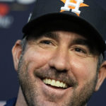 
              FILE - Houston Astros starting pitcher Justin Verlander speaks to media ahead of Game 1 of the baseball World Series between the Houston Astros and the Philadelphia Phillies on Thursday, Oct. 27, 2022, in Houston. Justin Verlander agreed to an $86.7 million, two-year contract with the New York Mets on Monday, Dec. 5, 2022, reuniting the AL Cy Young Award winner with Max Scherzer and giving the Mets a high-profile replacement for Jacob deGrom. (AP Photo/Eric Gay, File)
            