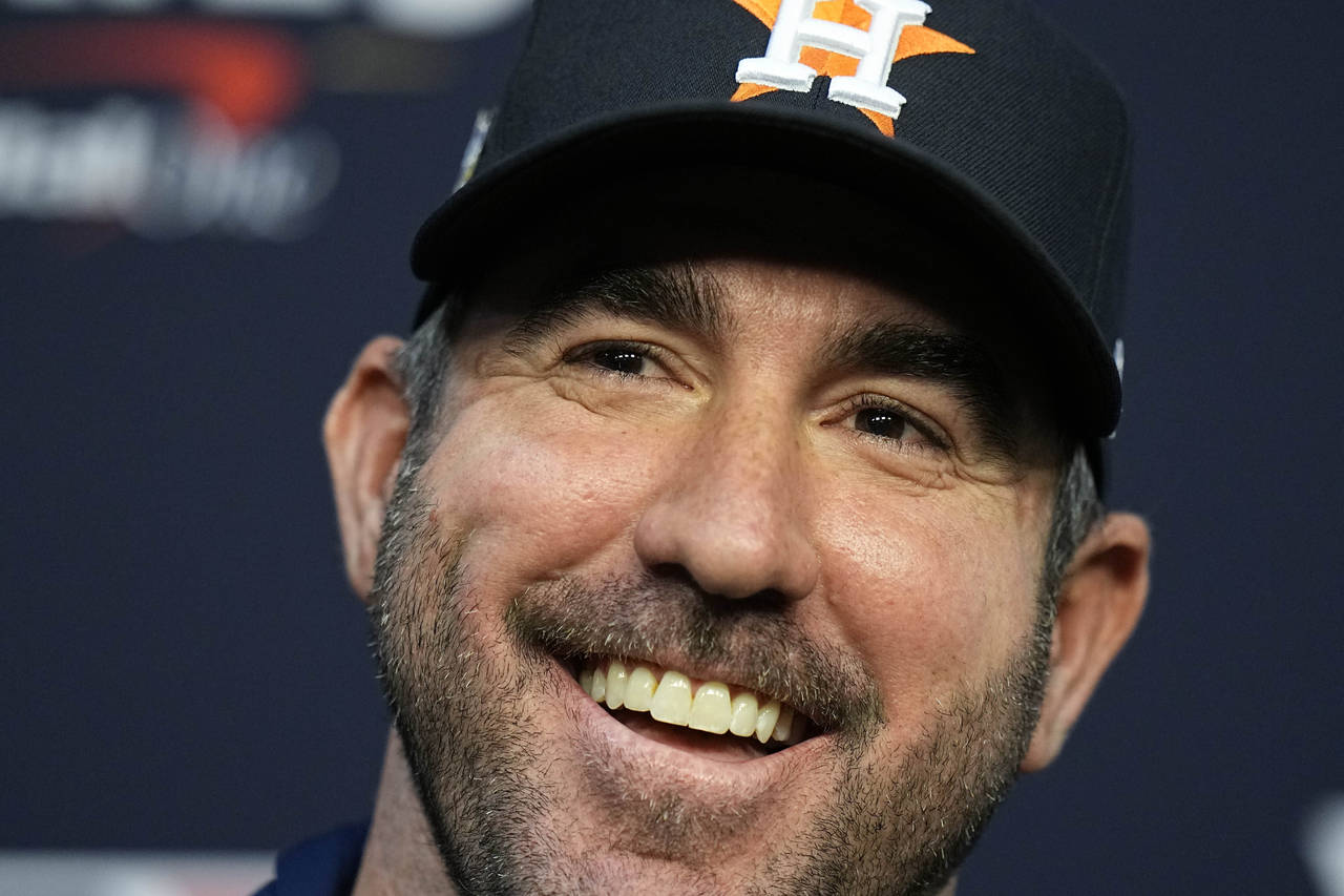 FILE - Houston Astros starting pitcher Justin Verlander speaks to media ahead of Game 1 of the base...