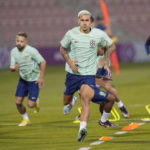 
              Brazil's Pedro exercises during a training session at the Grand Hamad stadium in Doha, Qatar, Thursday, Dec. 1, 2022. Brazil will face Cameroon in a group G World Cup soccer match on Dec. 2. (AP Photo/Andre Penner)
            