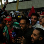 
              Moroccans celebrate in Rabat, Morocco, Saturday Dec. 10, 2022 their teams victory over Portugal in the World Cup quarter final soccer match played in Qatar. (AP Photo/Mosa'ab Elshamy)
            