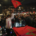 
              FILE - Morocco fans celebrate their team's victory against Spain in the World Cup round of 16 soccer match between Morocco and Spain, in Amsterdam, Netherlands, Tuesday, Dec. 6, 2022. (AP Photo/Peter Dejong, File)
            