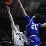 
              Purdue guard Braden Smith (3) shoots over New Orleans guard Khaleb Wilson-Rouse (20) during the second half of an NCAA college basketball game in West Lafayette, Ind., Wednesday, Dec. 21, 2022. (AP Photo/Michael Conroy)
            