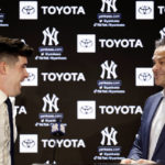 
              New York Yankees' Carlos Rodon, left,  talks with manager Aaron Boone during his introductory baseball news conference at Yankee Stadium, Thursday, Dec. 22, 2022, in New York. (AP Photo/Adam Hunger)
            