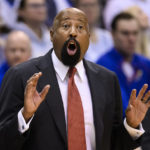 
              Indiana head coach Mike Woodson calls instructions to his team during the first half of an NCAA college basketball game against Kansas in Lawrence, Kan., Saturday, Dec. 17, 2022. (AP Photo/Reed Hoffmann)
            