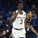 
              Notre Dame's Trey Wertz (3) celebrates scoring during the first half of an NCAA college basketball game against Miami, Friday, Dec. 30, 2022 in South Bend, Ind. (AP Photo/Michael Caterina)
            