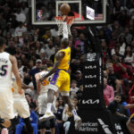 
              Los Angeles Lakers forward LeBron James (6) goes to the basket during the first half of an NBA basketball game against the Miami Heat, Wednesday, Dec. 28, 2022, in Miami. (AP Photo/Lynne Sladky)
            