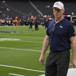 
              Denver Broncos assistant coach Jerry Rosburg walks around Allegiant Stadium during warm-ups before an NFL football game, Sunday, Oct. 2, 2022 in Las Vegas. Rosburg was named the Broncos' interim head coach on Monday, Dec. 26, 2022 after the team's rookie head coach Nathaniel Hackett was dismissed by team officials. (RJ Sangosti/The Denver Post via AP)
            