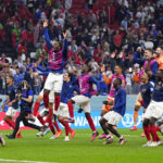 
              France players celebrate at the end of the World Cup semifinal soccer match between France and Morocco at the Al Bayt Stadium in Al Khor, Qatar, Wednesday, Dec. 14, 2022. France won 2-0 and will play Argentina in Sunday's final. (AP Photo/Manu Fernandez)
            